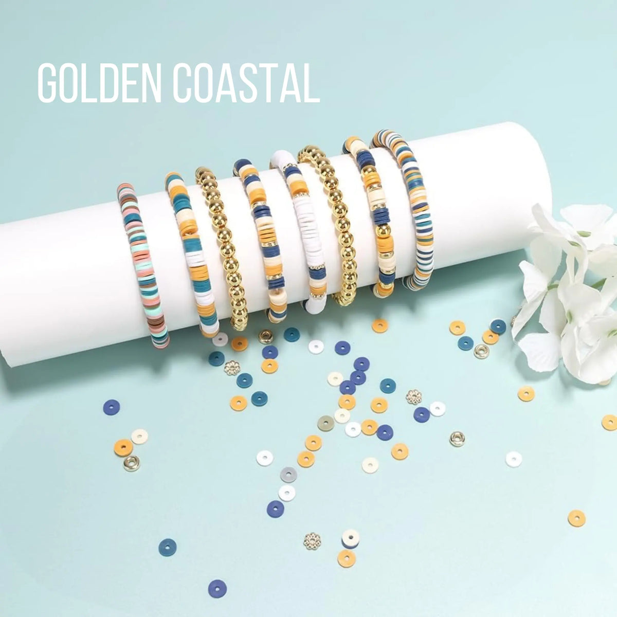 Workshop kit for bracelet stacking by Winks Design Studio, LLC, featuring assorted beads, string, and tools for jewelry making.