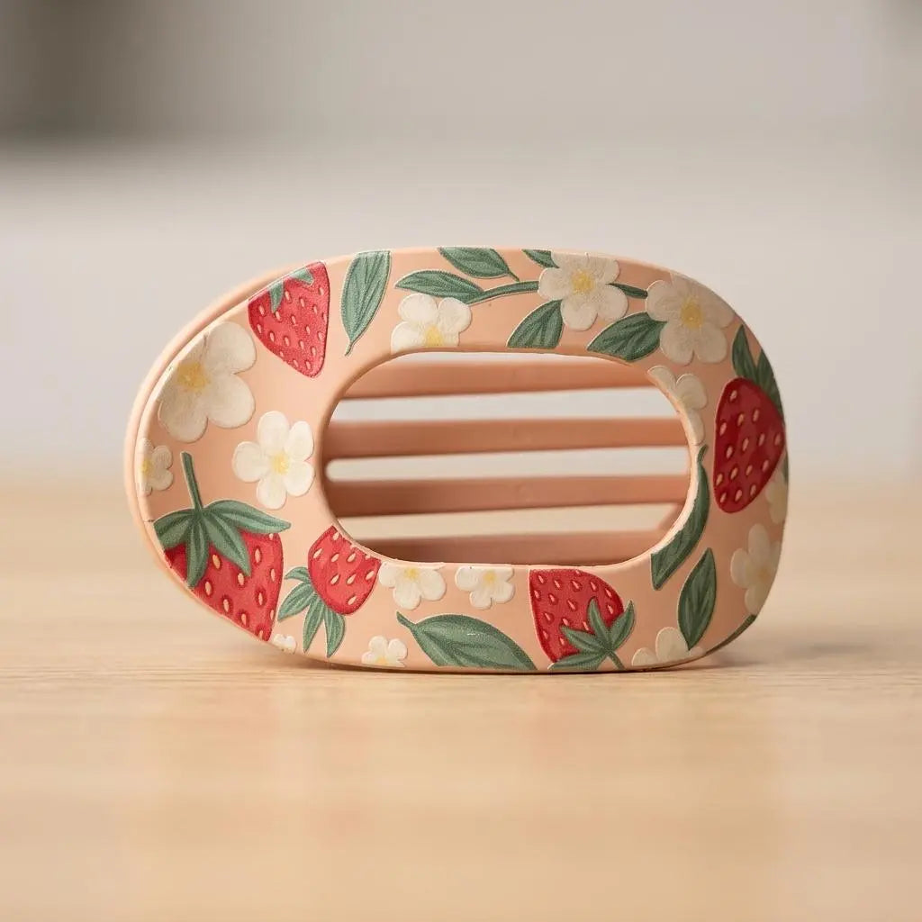 Sweet summer strawberry claw clip by Winks Design Studio, LLC, featuring a colorful strawberry design for stylish hair accessorizing.