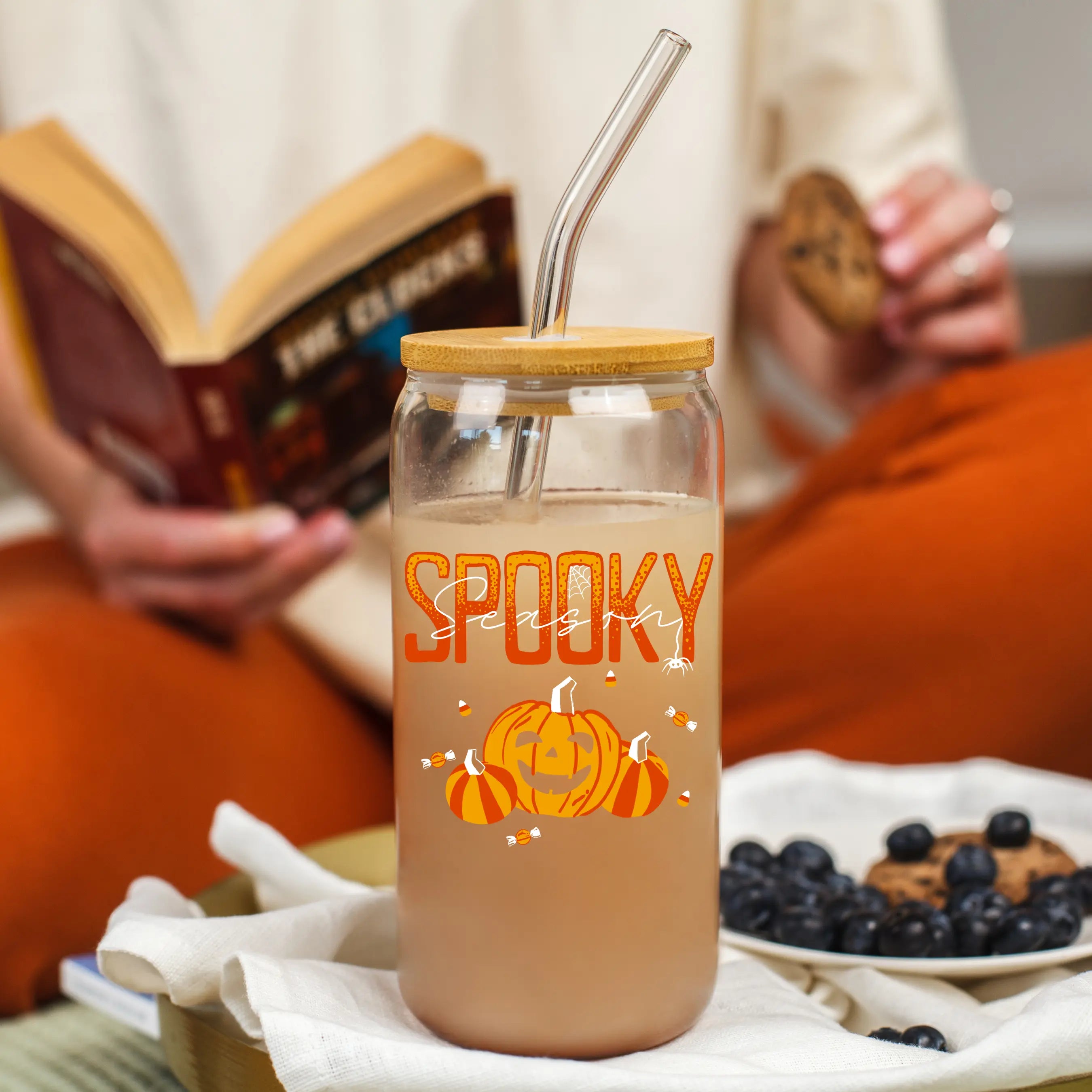 Clear glass 20oz beer can featuring spooky season design by Winks Design Studio, LLC.