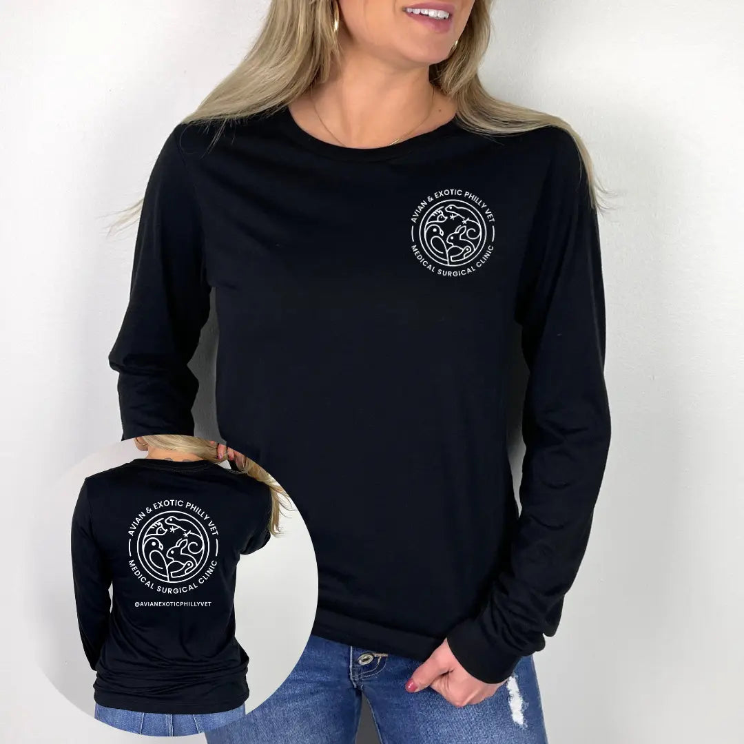 Winks Design Studio LLC Avian Exotic Long Sleeve shirt featuring vibrant bird and floral print on soft fabric.
