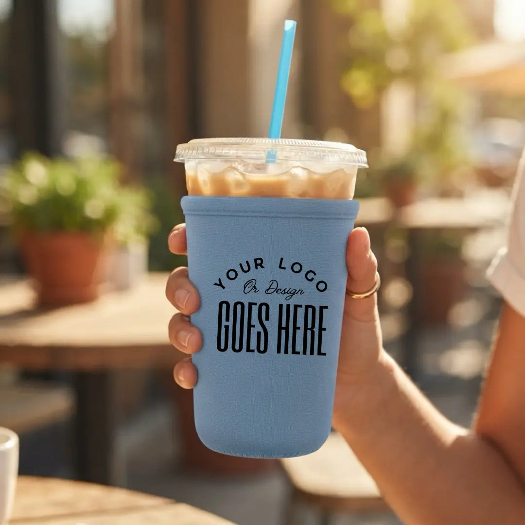 Custom neoprene cup sleeve by Winks Design Studio, LLC, featuring vibrant patterns and snug fit for hot and cold beverage cups.