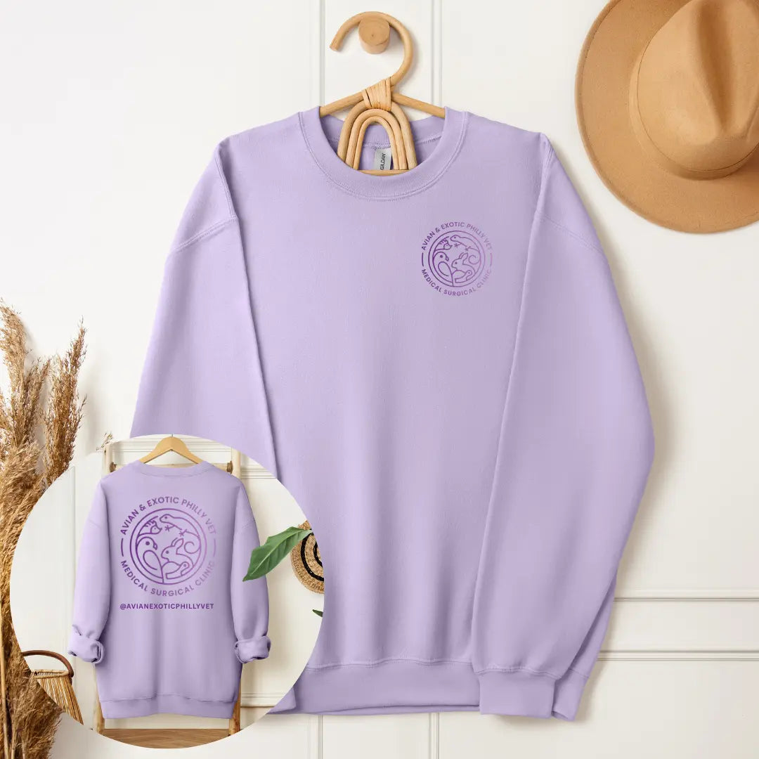 Winks Design Studio, LLC Avian Exotic Crewneck Sweatshirt featuring a colorful bird print on a soft, comfortable fabric.