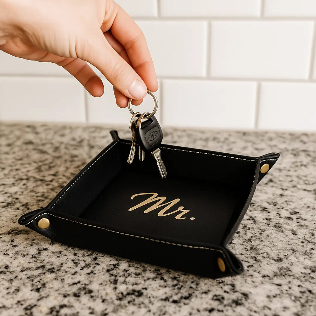 Custom engraved valet tray by Winks Design Studio, LLC, showing a sleek wooden tray with personalized engraved design.