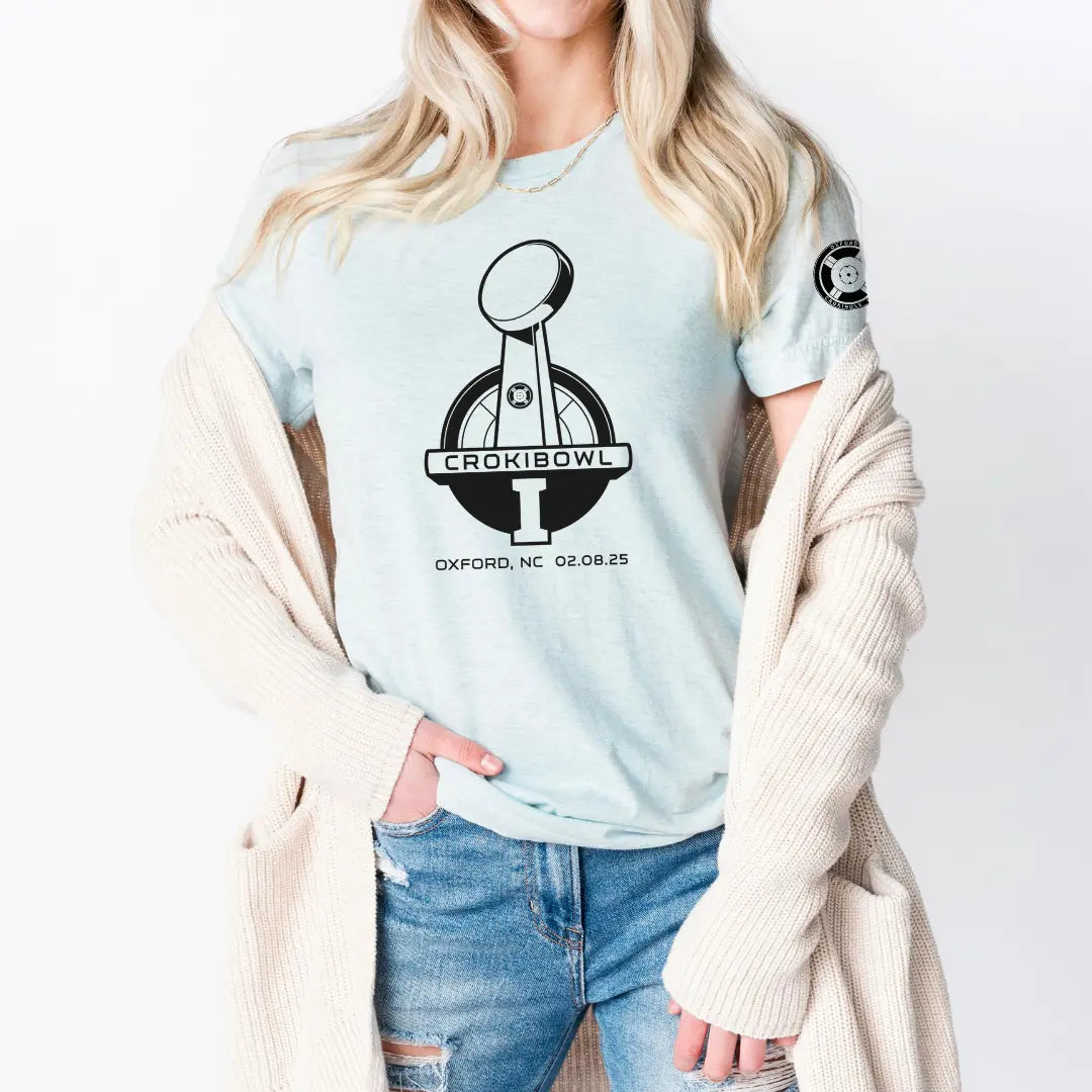 Winks Design Studio LLC Oxford Crokinole Club Crokibowl T-shirt featuring a casual fit and printed design on light fabric.