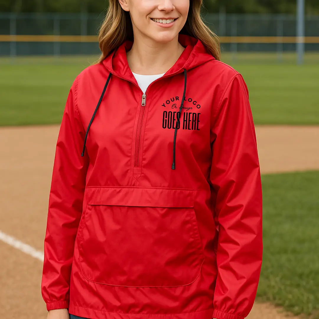 Red custom quarter zip pullover windbreaker with a black "Your Logo or Design Goes Here" left chest placeholder print