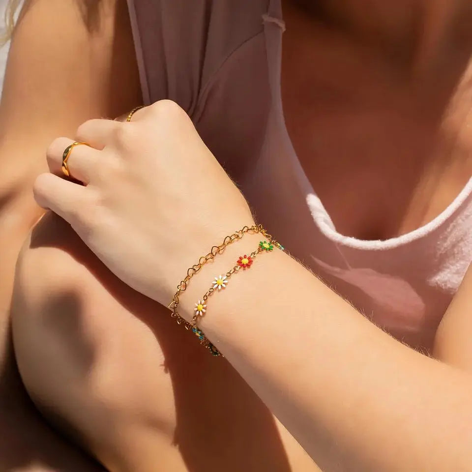 18K gold heart chain bracelet with delicate links, featuring a sparkling heart pendant, crafted by Winks Design Studio, LLC.