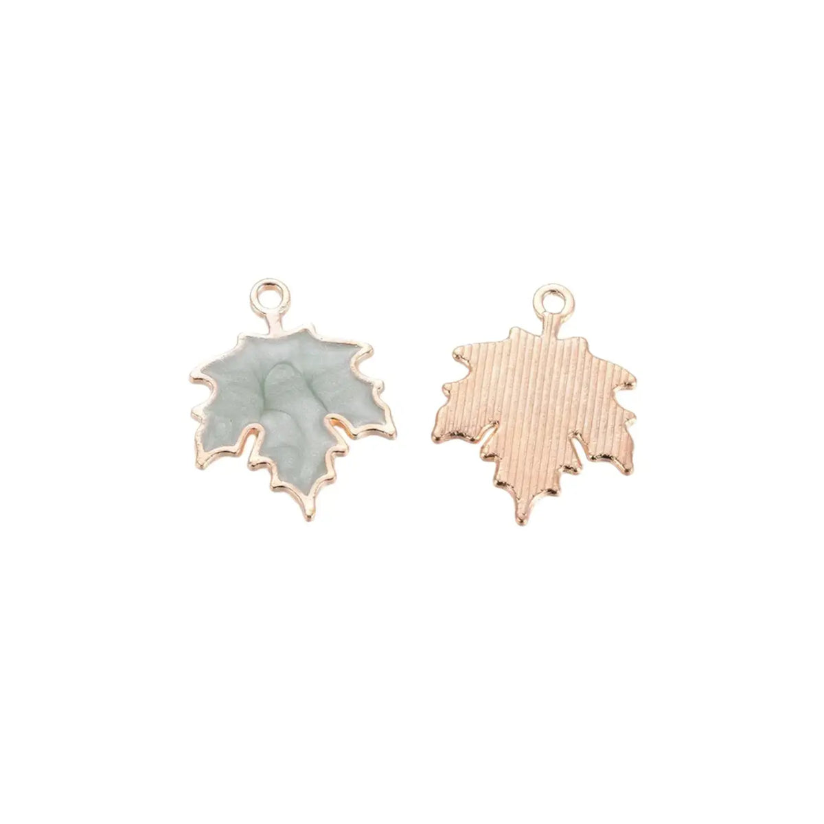 Gold marbled leaf charm by Winks Design Studio, LLC, featuring a detailed leaf shape with gold and marbled design.