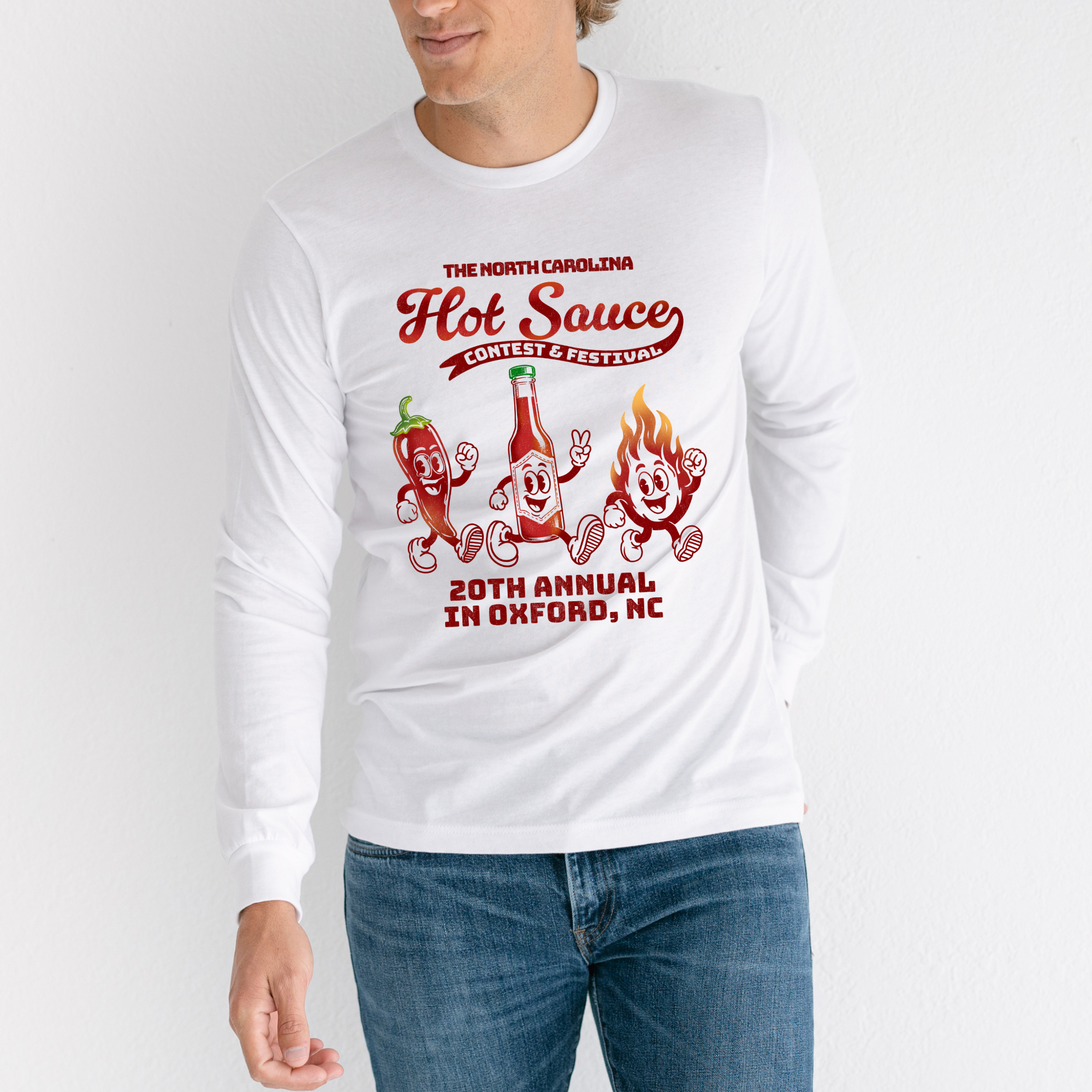 Winks Design Studio NC Hot Sauce Festival retro character long sleeve shirt with colorful graphic print on black fabric