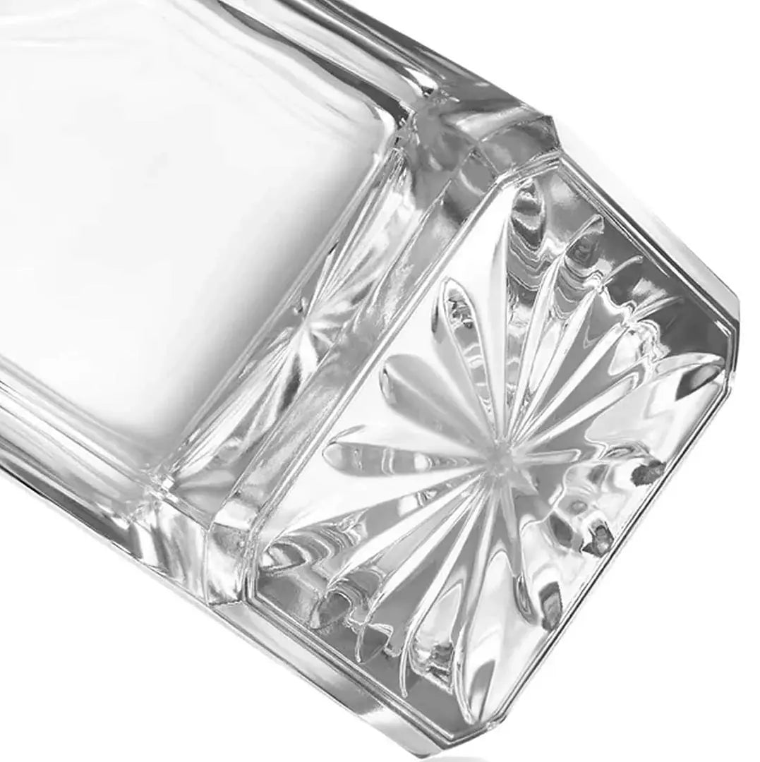 Custom engraved glass decanter by Winks Design Studio, LLC, featuring a clear glass body and elegant design for storing spirits.