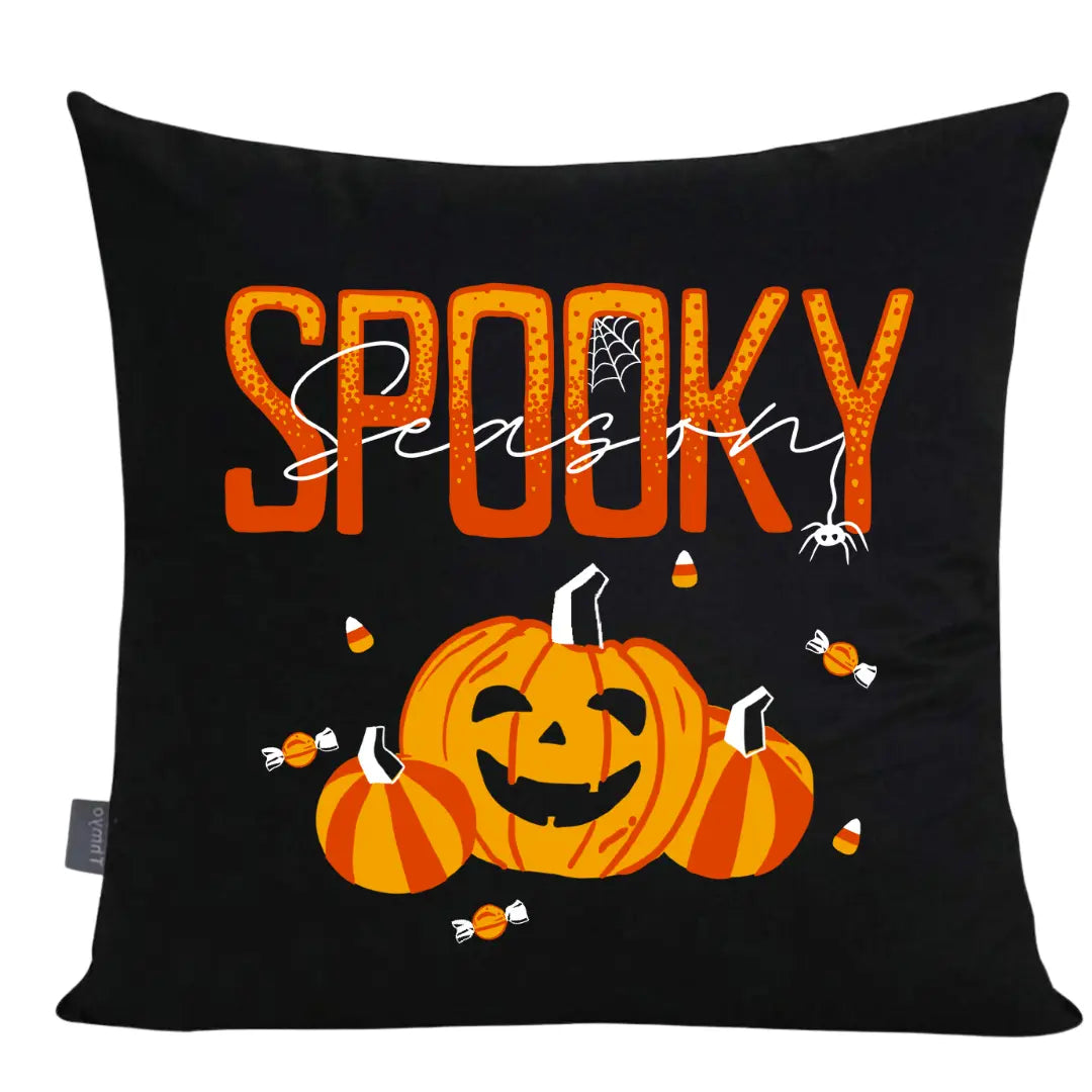 Spooky Season pillow by Winks Design Studio, LLC with Halloween-themed spooky design and vibrant orange and black colors.