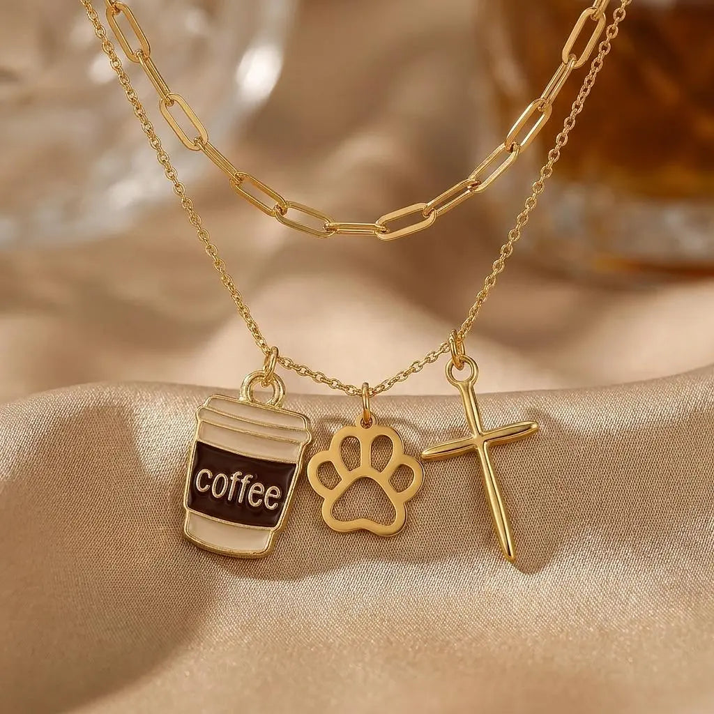 18K gold epoxy coffee cup charm by Winks Design Studio, LLC, featuring a detailed miniature coffee cup with gold accents.