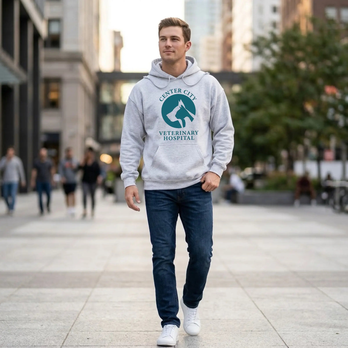 Winks Design Studio Center City Vet front pouch hoodie in gray showing a cozy, casual fit with a front kangaroo pocket.