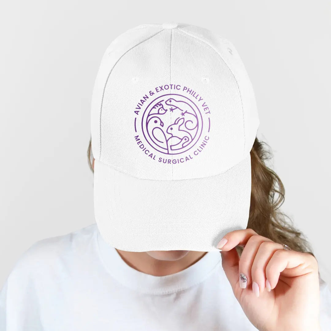 Winks Design Studio, LLC Avian Exotic Twill Hat featuring a stylish, patterned design with a curved brim and adjustable strap.