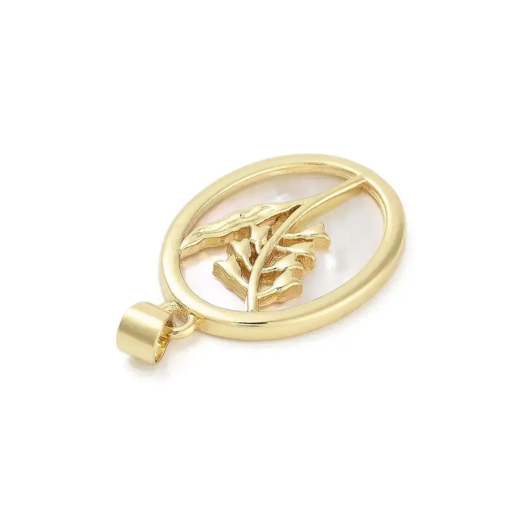 Gold shell floral pendant charm from Winks Design Studio with intricate floral and shell details, crafted in shiny gold.