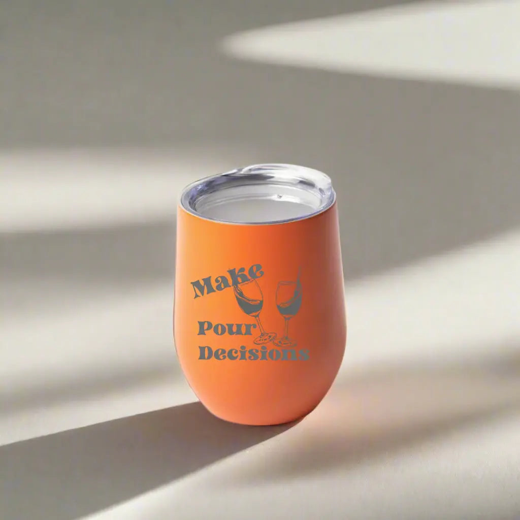 Stemless wine tumbler from Winks Design Studio, LLC with "Make Pour Decisions" printed in black on a 12oz wine glass.