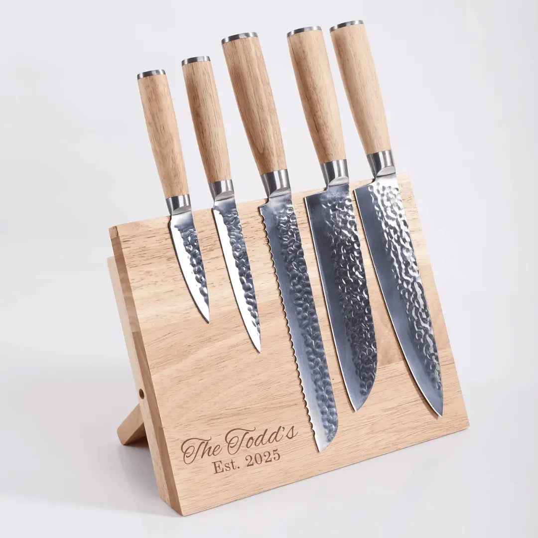 Set of six custom engraved chef knives with stainless steel blades and magnetic rubberwood storage block by Winks Design Studio.