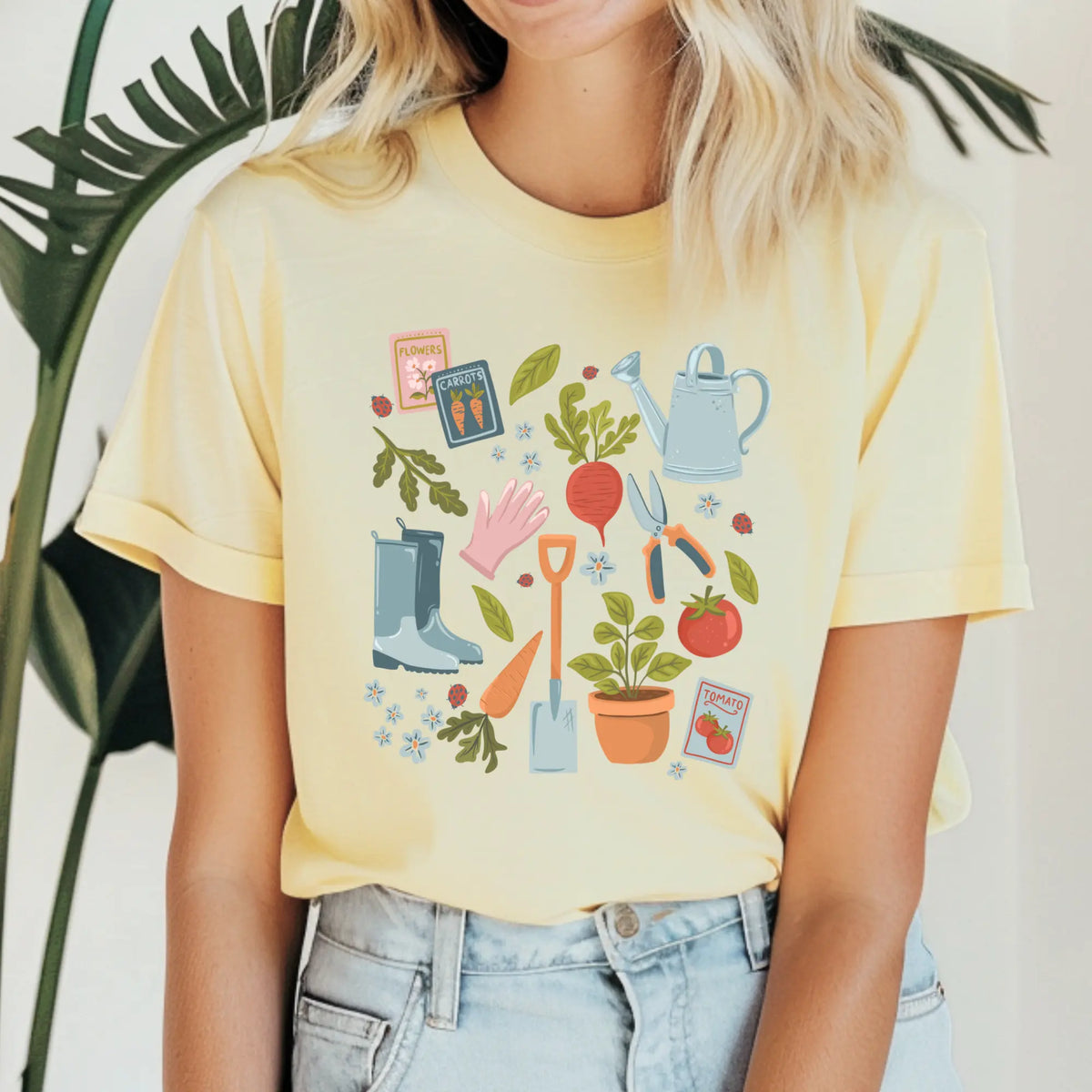 Winks Design Studio Garden Essentials Tee, casual green shirt with garden-themed design, made from soft cotton fabric.