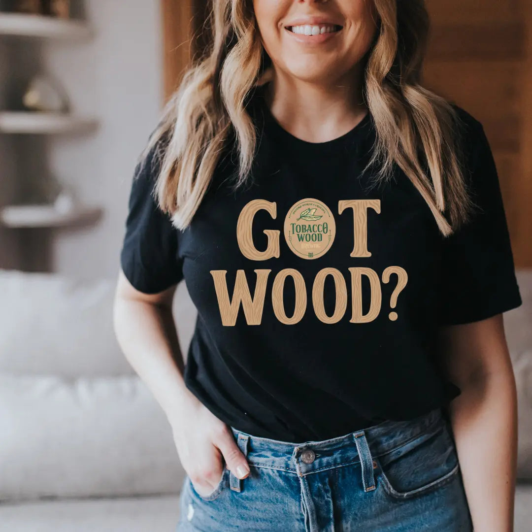 Tobacco Wood Brewing T-shirt by Winks Design Studio, LLC featuring a natural wood-themed graphic on a casual black T-shirt.
