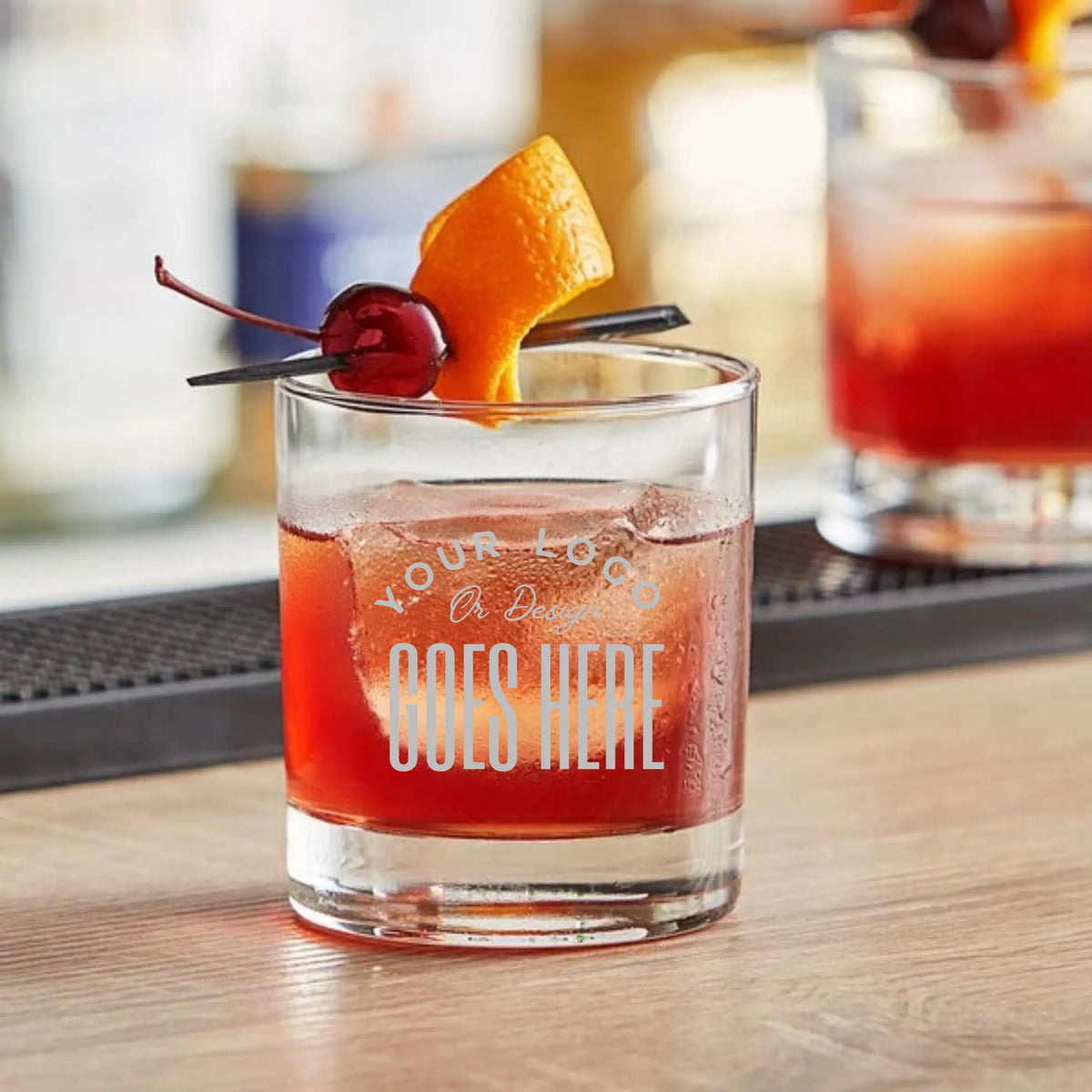 Customizable 10oz rocks glasses from Winks Design Studio, LLC, featuring clear glass with a smooth, rounded shape and sturdy base.
