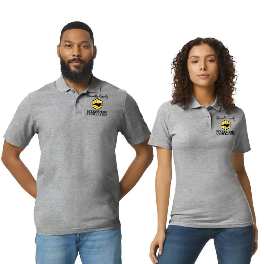 Gildan polo shirt with Winks Design Studio logo, featuring a classic collar, short sleeves, and embroidered branding on the chest.