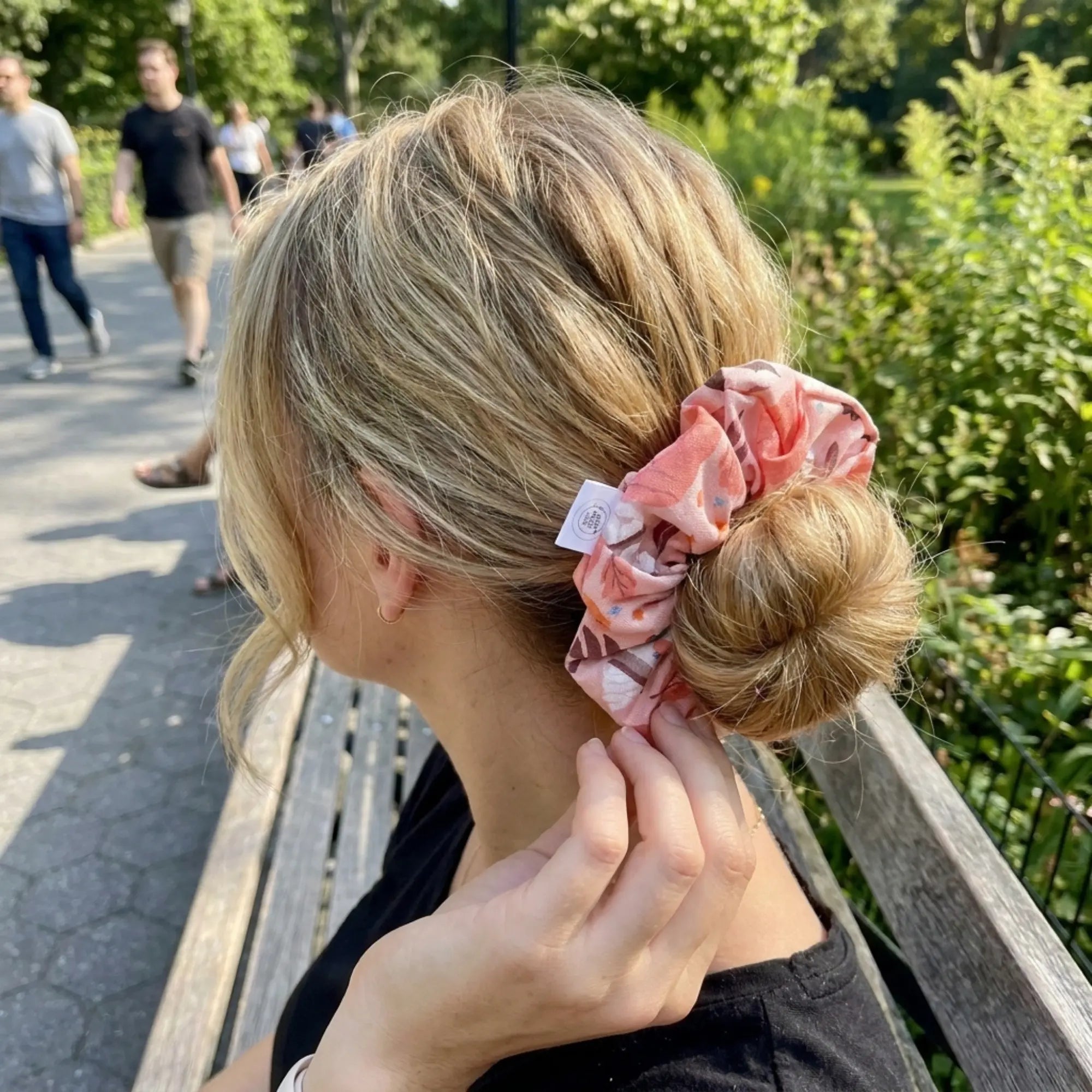 Fall-themed pumpkin patch scrunchie by Winks Design Studio, LLC featuring cozy autumn colors and patterns for hair accessory.