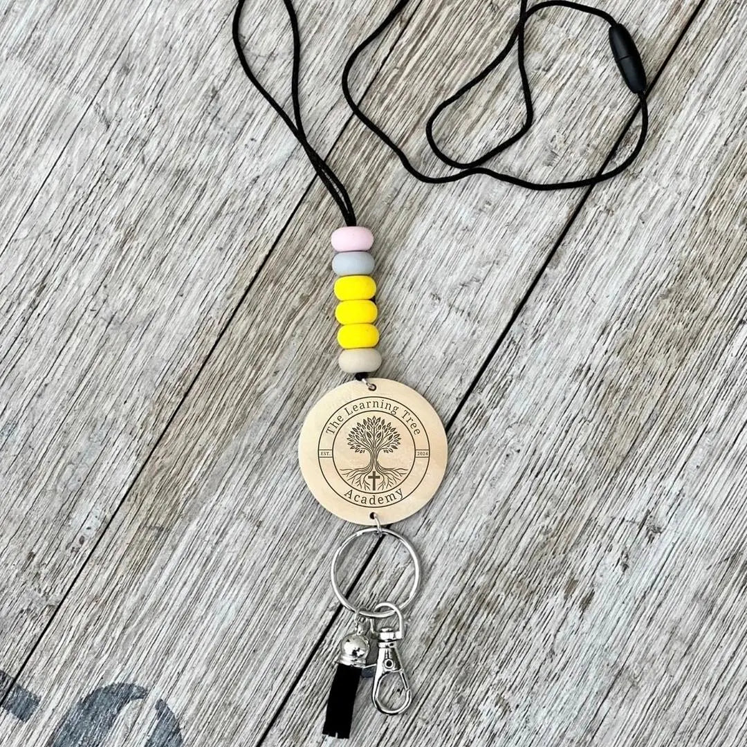 Custom silicone pencil bead lanyard necklace by Winks Design Studio, LLC with colorful beads and adjustable cord.
