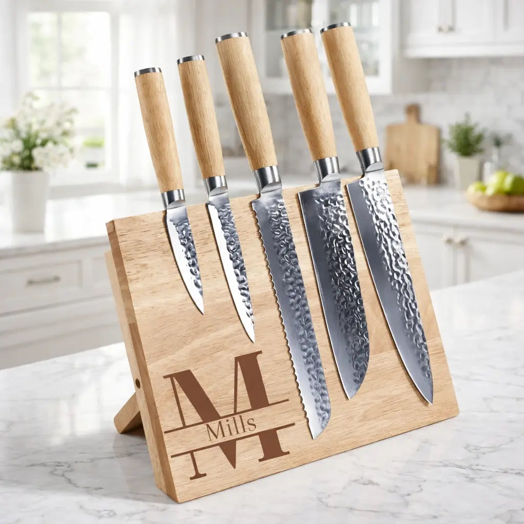 Set of six custom engraved Winks Design Studio chef knives with magnetic rubberwood block for kitchen and dining use.