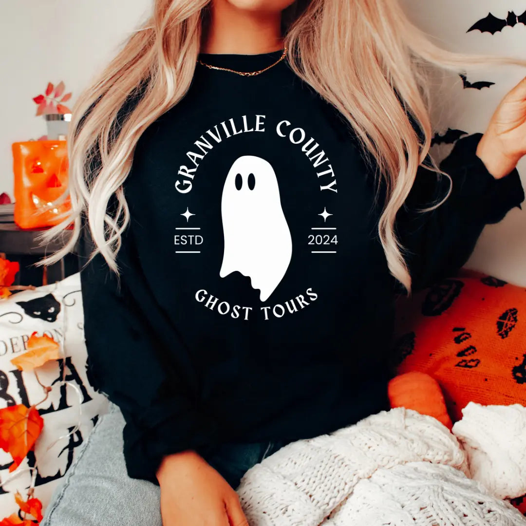 Winks Design Studio LLC Granville County Ghost Tours long sleeve shirt featuring spooky ghost and haunted county imagery.