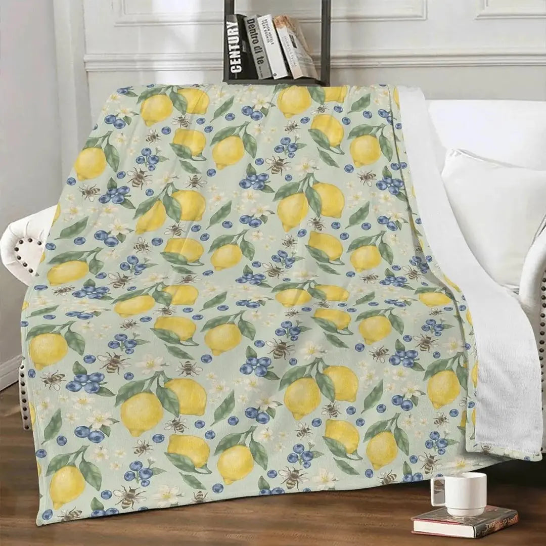 Winks Design Studio Lemonberry Bloom fleece blanket, 80x60 cozy floral throw with vibrant lemon and berry floral pattern.
