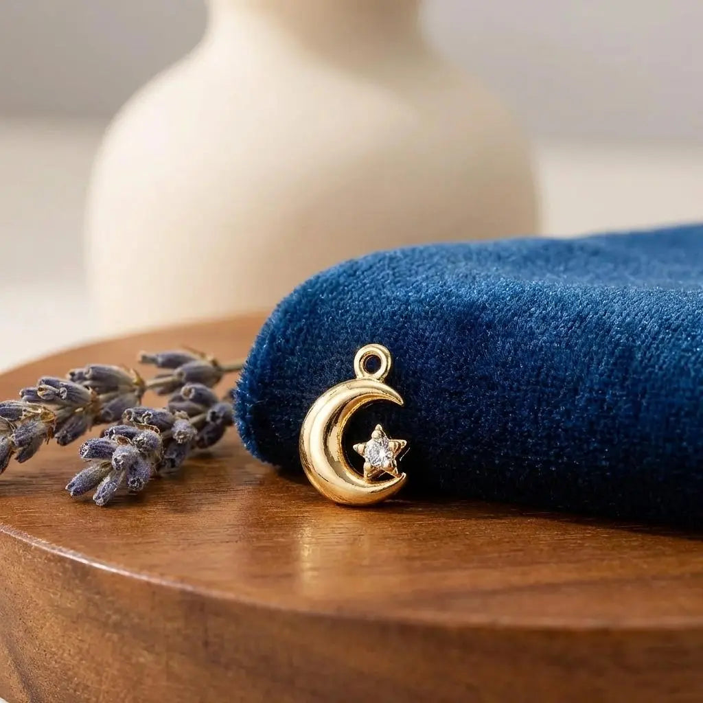 Tiny moon and star charm jewelry from Winks Design Studio, LLC, featuring a delicate moon and star pendant.