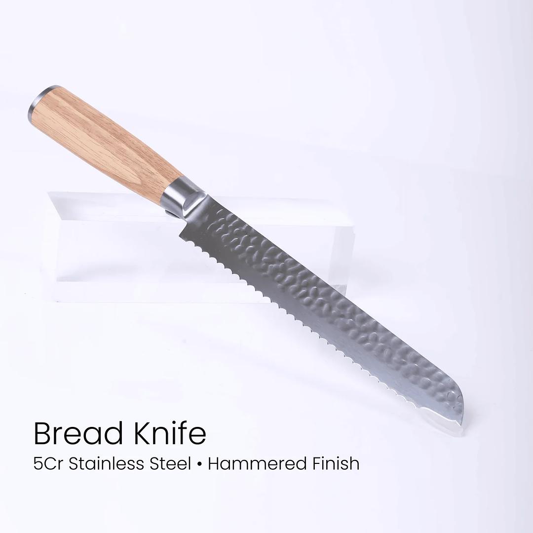 Bread knife with wooden handle on a white background