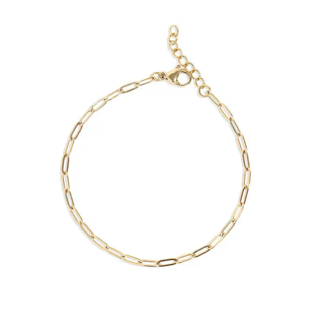 18K gold paperclip chain bracelet by Winks Design Studio, LLC, featuring sleek interconnected paperclip links on a white background.