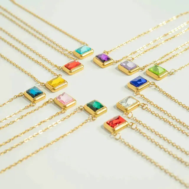 18K gold emerald birthstone connector charm with intricate design, featuring a vibrant green emerald gemstone.