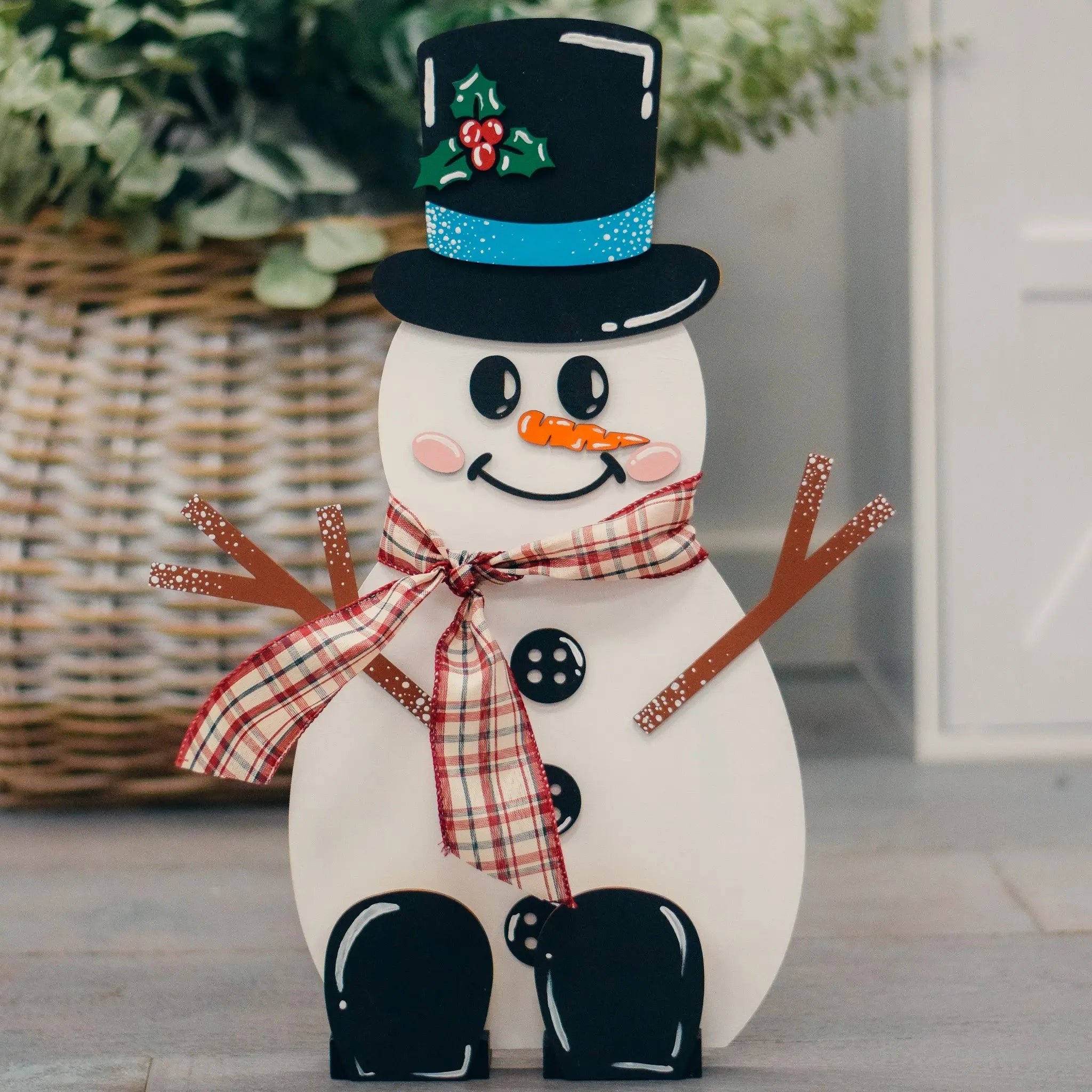 DIY wooden snowman craft kit by Winks Design Studio, LLC, featuring paintable holiday snowman decoration with crafting supplies.
