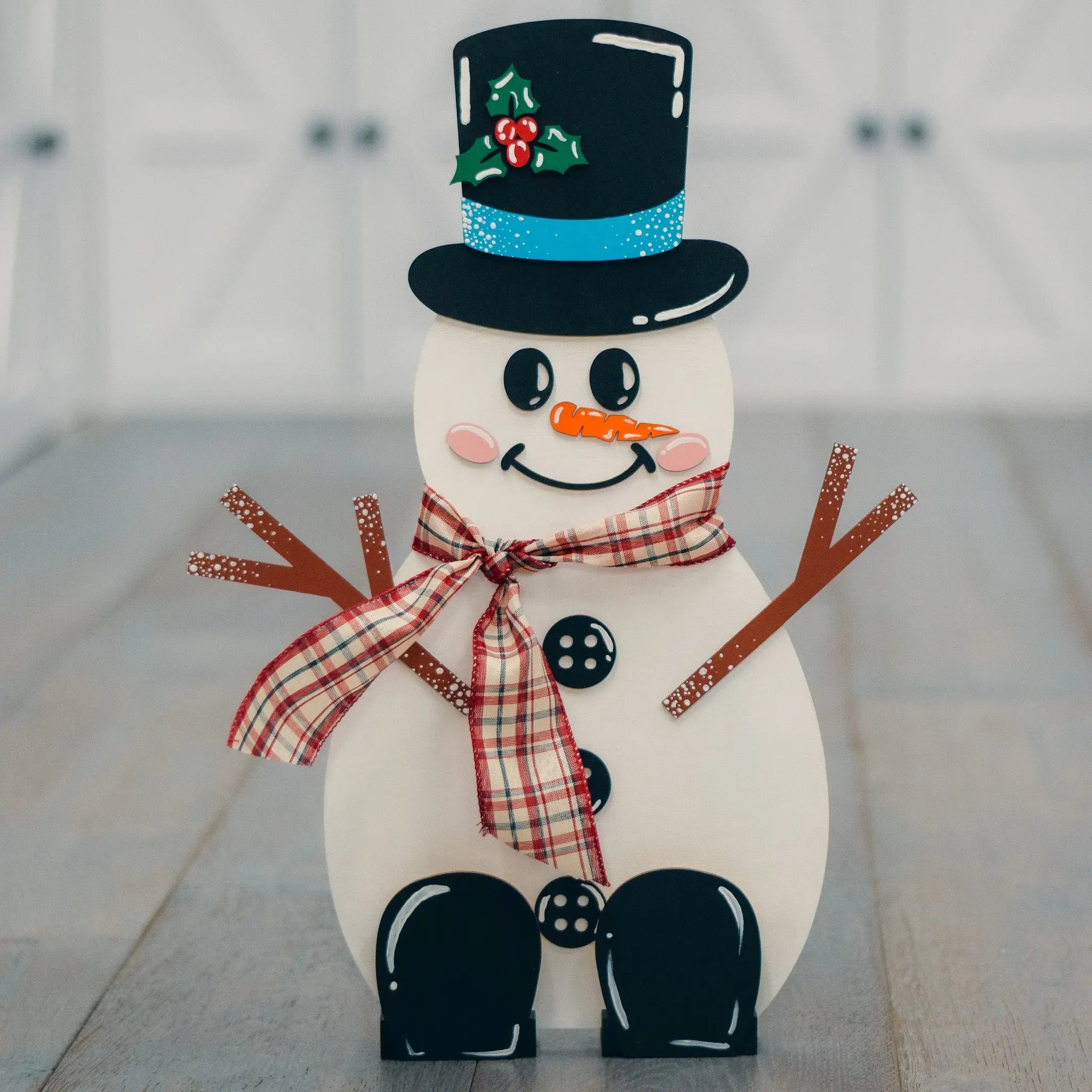 DIY Wooden Snowman craft kit by Winks Design Studio, LLC, featuring paintable holiday snowman decoration with wooden pieces and supplies.