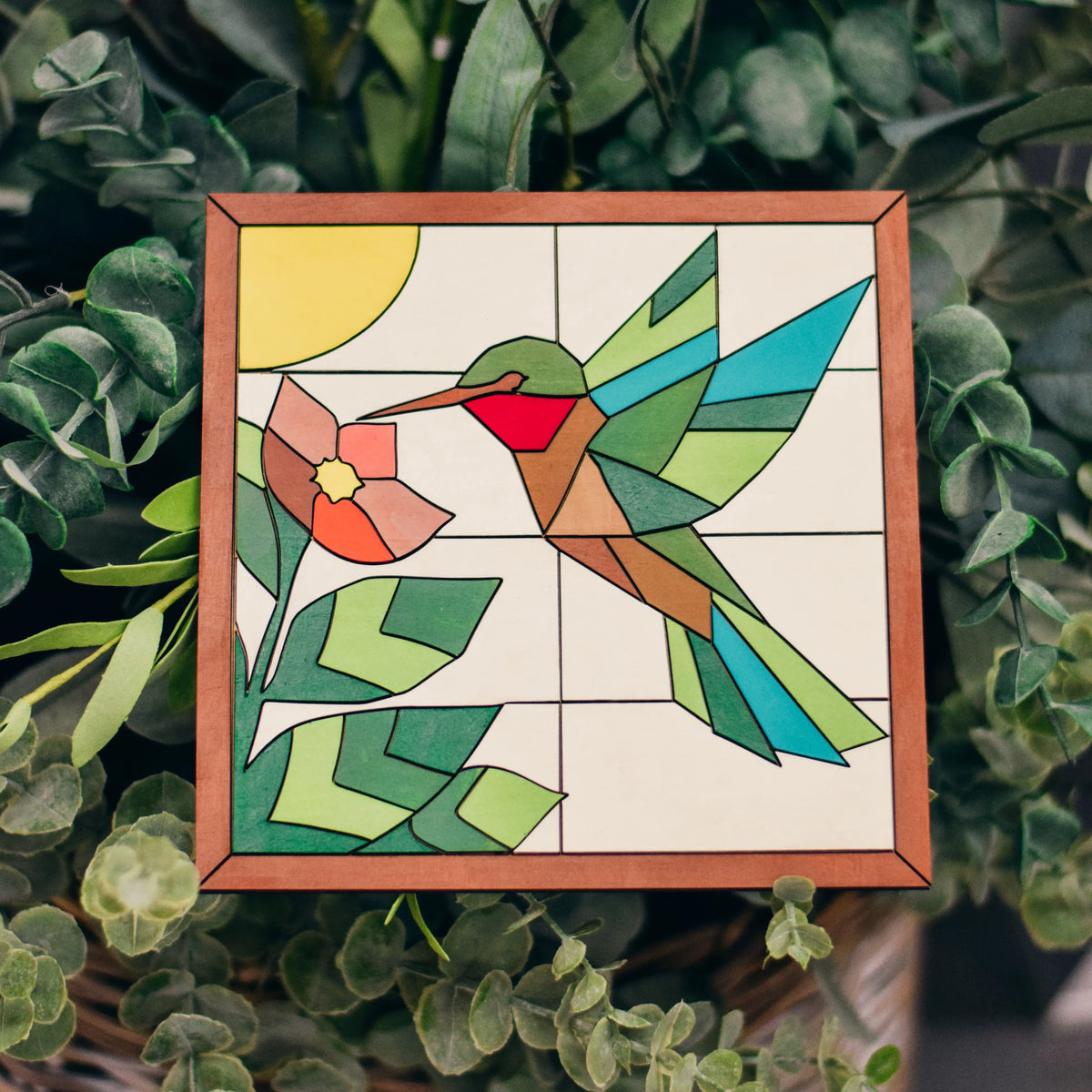 DIY hummingbird wooden mosaic sign kit by Winks Design Studio, LLC, featuring colorful mosaic pieces for craft workshop projects.