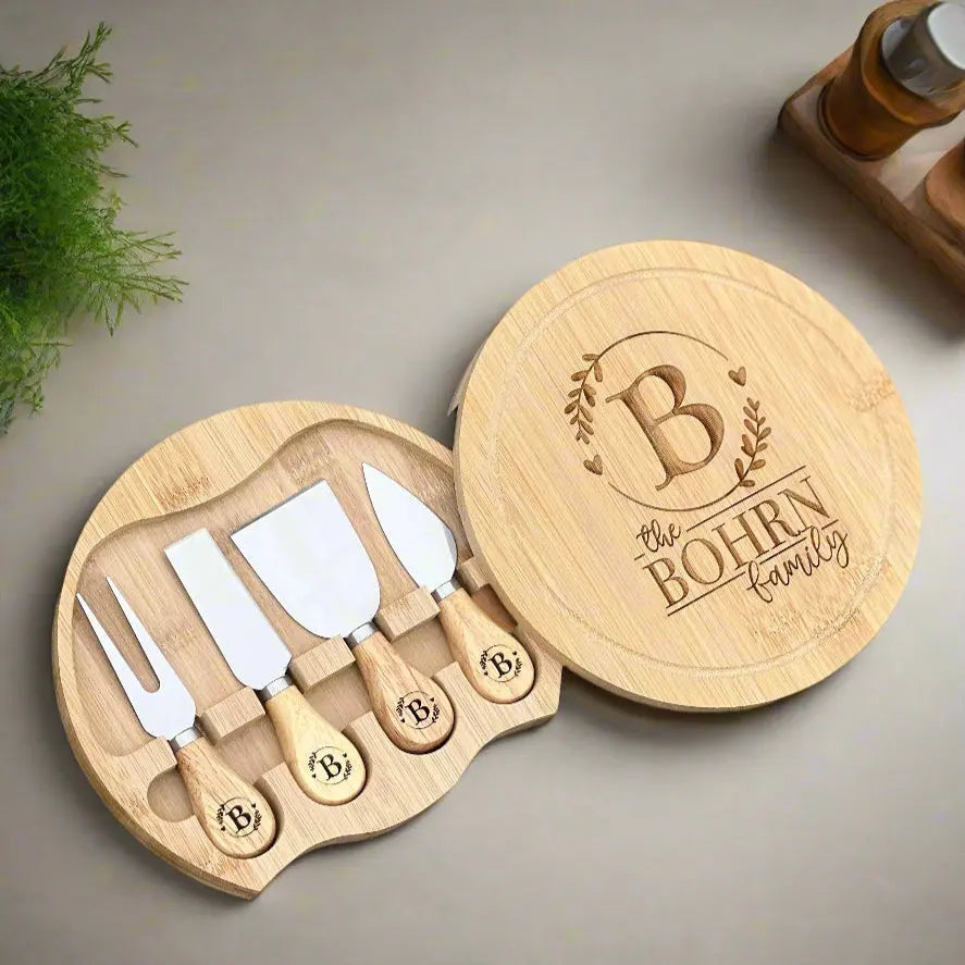 Custom genuine bamboo cheese board set by Winks Design Studio, LLC, featuring a smooth bamboo surface with cheese utensils and accessories.