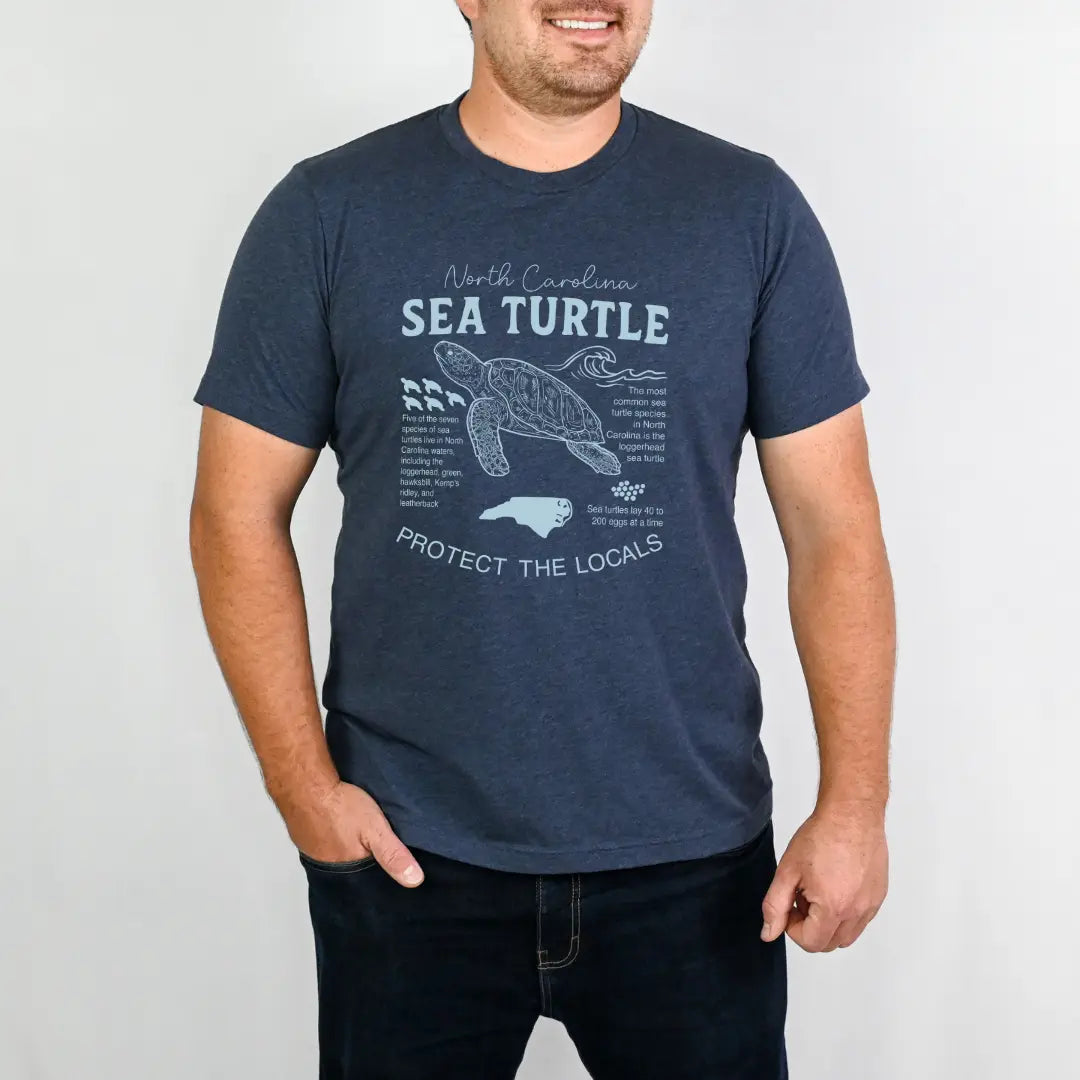 North Carolina Coastal Sea Turtle T-shirt by Winks Design Studio, LLC featuring a detailed sea turtle graphic on soft fabric.
