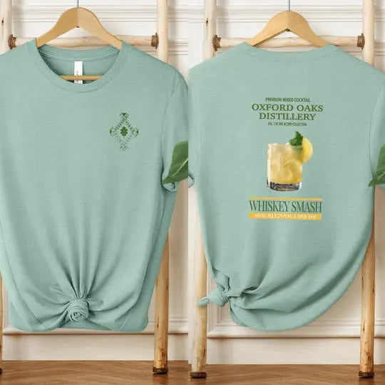 Winks Design Studio whiskey smash T-shirt featuring a stylish graphic design and casual fit, ideal for whiskey lovers.