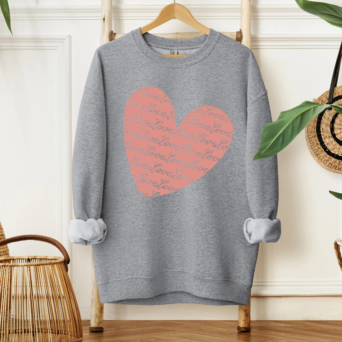 Love Script Heart crewneck by Winks Design Studio, LLC, featuring a cozy knit fabric with a romantic heart and love script design.