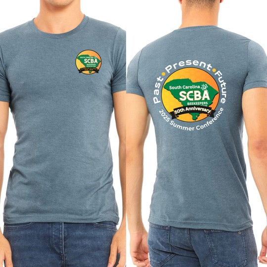 Blue t-shirt with SCBA logo on front and back, worn by a person.