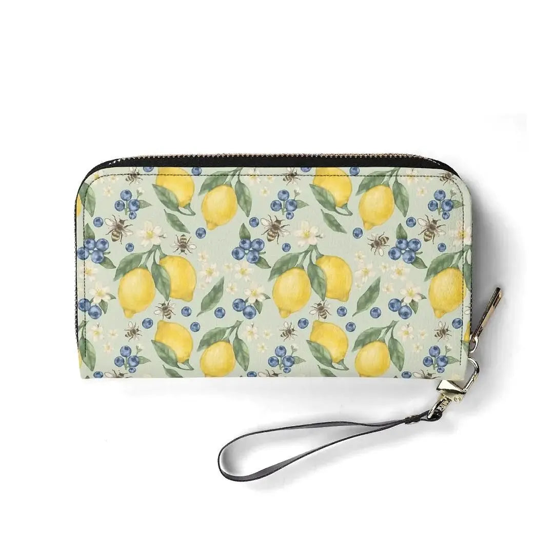 Lemonberry Bloom leather wallet by Winks Design Studio, LLC, featuring vibrant yellow and pink floral design and multiple card slots.