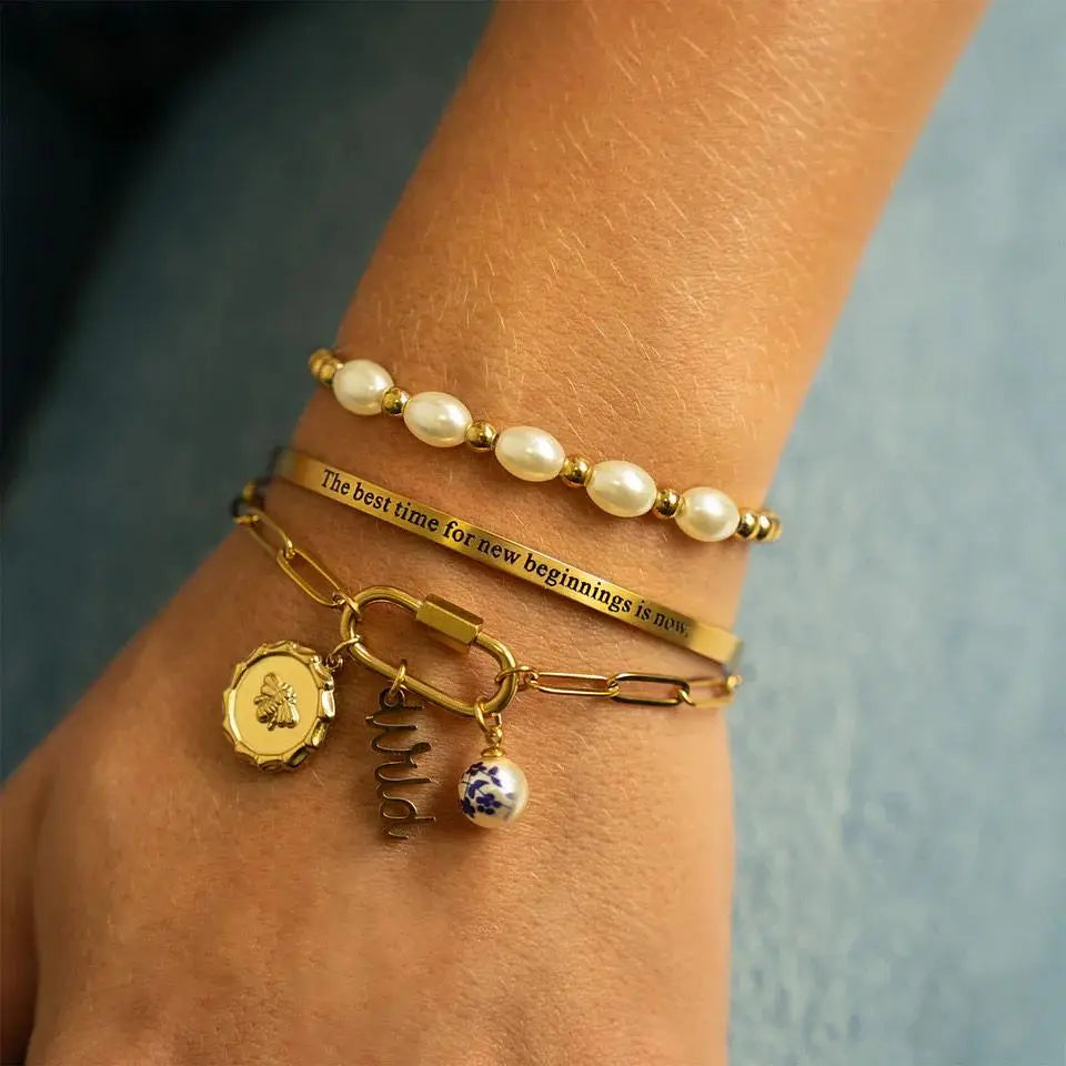 18K gold glass pearl stretch bracelet by Winks Design Studio, LLC featuring elegant pearl beads on a flexible band