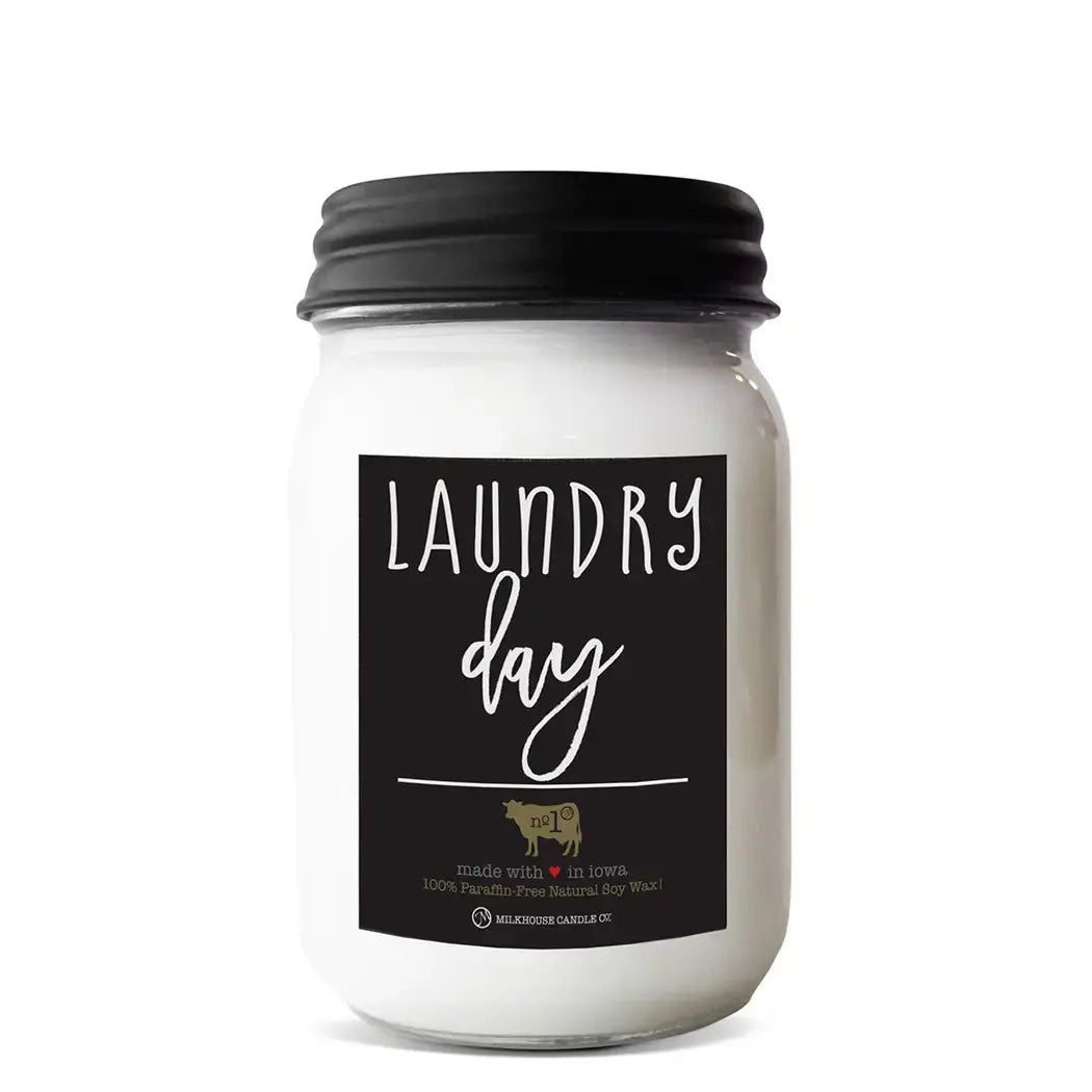 Winks Design Studio Milkhouse Candle Laundry Day in 13 oz mason jar with rustic label, showcasing a cozy, scented candle.