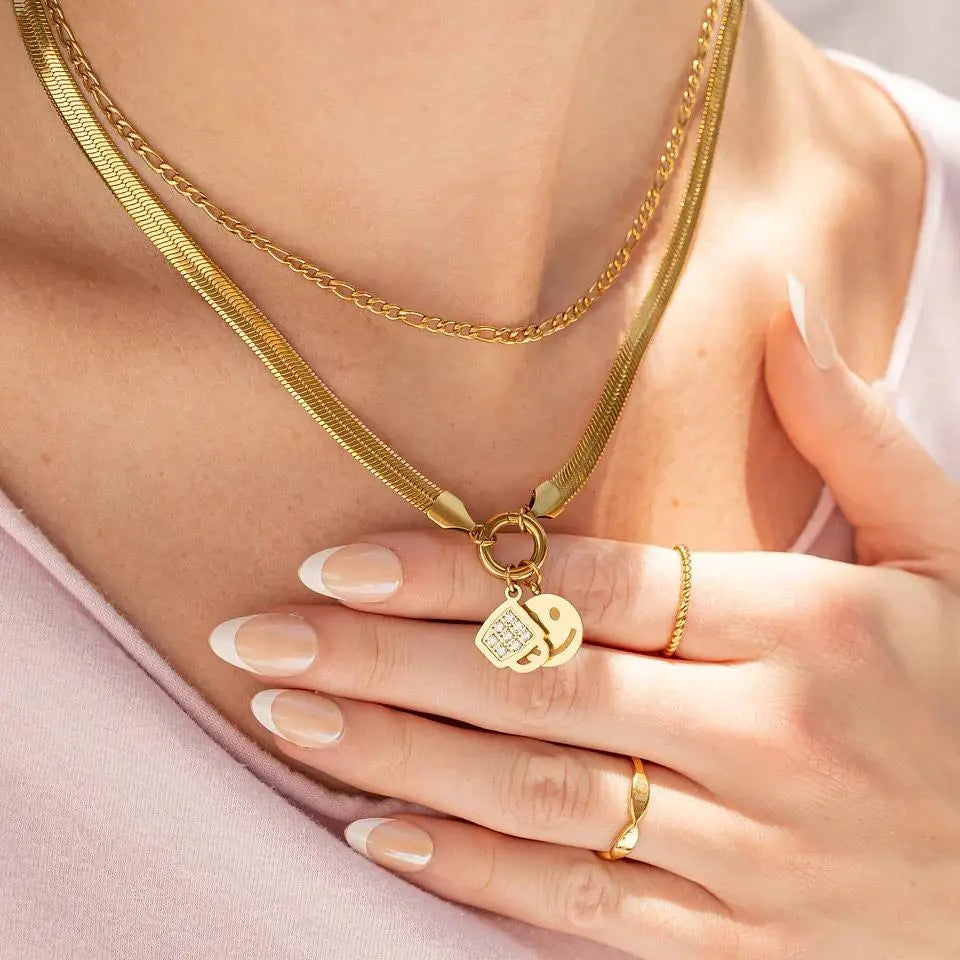18K gold coffee cup charm by Winks Design Studio, LLC featuring detailed miniature coffee cup pendant for jewelry or accessories.