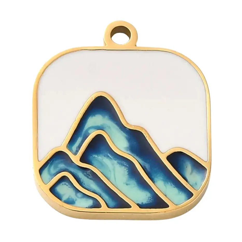 Gold mountain range pendant charm by Winks Design Studio, LLC featuring detailed mountain silhouette design.