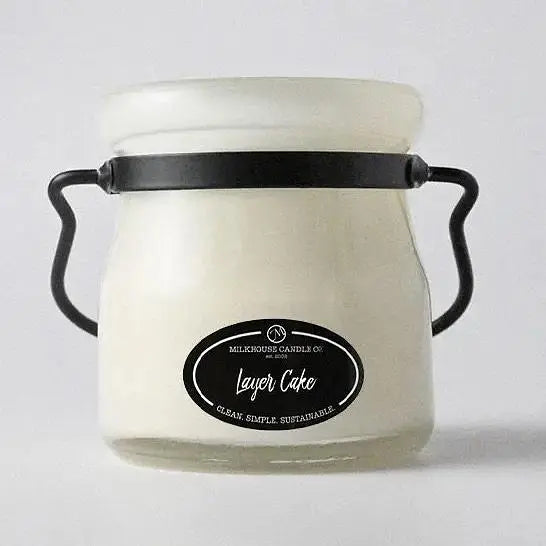 Winks Design Studio Milkhouse Candle 5oz cream jar with Layer Cake scent, showing the candle in a clear glass jar with a white lid.