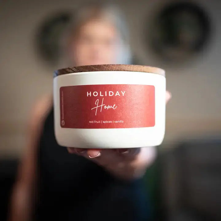Winks Design Studio Milkhouse Candle Holiday Home 10 oz statement candle with festive holiday design and warm glow