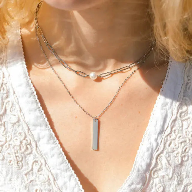 18K gold engraved vertical bar necklace with personalized stainless steel pendant, stylish jewelry from Winks Design Studio.