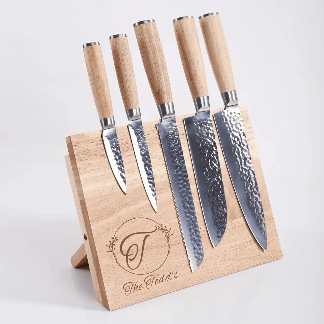 Set of six custom engraved chef knives with magnetic rubberwood block from Winks Design Studio, LLC, suitable for kitchen and dining use.
